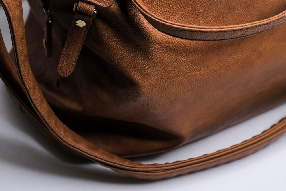 How to get rid of grease stains from leather purse?